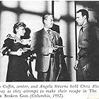 Chris Alcaide, Tristram Coffin, and Angela Stevens in The Kid from Broken Gun (1952)