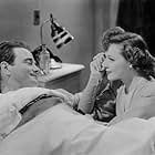 Lew Ayres and Laraine Day in Fingers at the Window (1942)