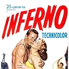 Rhonda Fleming and William Lundigan in Inferno (1953)