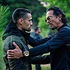 Benjamin Bratt and Freddy Miyares in DMZ (2022)