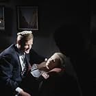 Roger Moore and Penelope Horner in The Saint (1962)