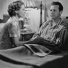 Dick Powell and Jane Wyatt in Pitfall (1948)