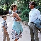 Melanie Griffith, Don Johnson, and Elijah Wood in Paradise (1991)