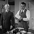 George Brent and Herbert Rawlinson in Dark Victory (1939)