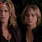 Natasha Henstridge and Kristen Miller in She Spies (2002)