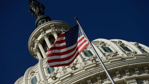 WASHINGTON, DC - SEPTEMBER 29:  An American flag waves outside the United States Capitol building as Congress remains gridlocked over legislation to continue funding the federal government September 29, 2013 in Washington, DC. The House of Representatives passed a continuing resolution with language to defund U.S. President Barack Obama&apos;s national health care plan yesterday, but Senate Majority Leader Harry Reid has indicated the U.S. Senate will not consider the legislation as passed by the House.  (Photo by Win McNamee/Getty Images)