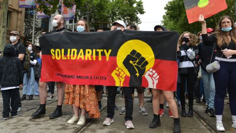 MELBOURNE, AUSTRALIA - JANUARY 26: Aboriginal Australians and Torres Strait Islanders, who opposed the British fleet&apos;s arrival on January 26, 1788, to be celebrated as "Australia Day", organize a demonstration describing this date as "Invasion Day" in Melbourne, Australia on January 26, 2021. (Photo by Recep Sakar/Anadolu Agency via Getty Images)