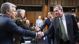 UNITED STATES - MARCH 8: Chairman Mark Warner, D-Va., right, shakes hands with FBI Director Christopher Wray, as Warner and ranking member Sen. Marco Rubio, R-Fla., greet witnesses during the Senate Select Intelligence Committee hearing on worldwide threats in Hart Building on Wednesday, March 8, 2023. From left are, Wray, National Security Agency Director Gen. Paul Nakasone, Director of National Intelligence Avril Haines, CIA Director William J.Burns, and Defense Intelligence Agency Director Lt. Gen. Scott D.Berrier. (Tom Williams/CQ Roll Call via AP Images) . W DIA Director General Paul Nakasone National Security Agency NSA