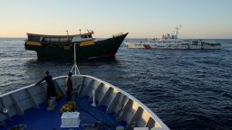 A Chinese coast guard ship, right, blocks Philippine resupply vessel Unaizah May 4, center, and Philippine coast guard BRP Sindangan as they tried to enter the Second Thomas Shoal, locally known as Ayungin Shoal, in the disputed South China Sea Tuesday, March 5, 2024. Chinese and Philippine coast guard vessels collided in the disputed South China Sea and multiple Filipino crew members were injured in high-seas confrontations Tuesday as Southeast Asian leaders gathered for a summit that was expected to touch on Beijing&apos;s aggression at sea. (AP Photo/Aaron Favila)