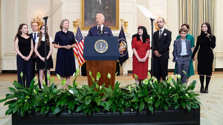 President Joe Biden, center, delivers remarks on a prisoner swap with Russia from the State Dining Room of the White House in Washington, DC, on August 1.