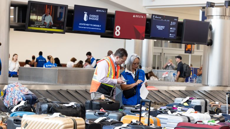 ATLANTA, GEORGIA - JULY 22: Delta employees try to locate passengers&apos; luggage after cancelled and delayed flights at Hartsfield-Jackson Atlanta International Airport on July 22, 2024 in Atlanta, Georgia. Delta Airlines cancelled over 700 flights on Monday due to the Crowdstrike software update, making up more than half of the flight cancellations in the U.S. (Photo by Jessica McGowan/Getty Images)