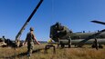 U.S. Army Soldiers with 90th Aviation Support Battalion and Delta Company, 7-158th General Support Aviation Battalion, 11th Expeditionary Combat Aviation Brigade, perform inspections on a CH-47 Chinook at North Fort Hood, TX on November 19, 2021. (U.S. Army photo by Cpl. Nicholas Fuel)