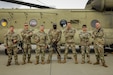 U.S. Army Soldiers assigned to the 982nd Signal Company (Combat Camera) (Airborne), pose for a photo during Leapfest on Aug 3, 2024 in Exeter, Rhode Island. Leapfest is the largest, longest standing, international static line parachute training event and competition hosted by the 56th Troop Command, Rhode Island Army National Guard to promote high level technical training and esprit de corps within the International Airborne community. (U.S. Army photo by Spc. Jacob Fontenot)