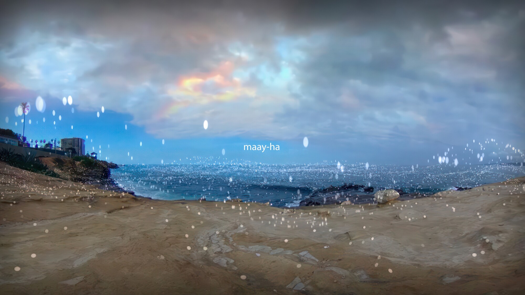 Sky, ocean and land with floating white particles and words in white "maay-ha"