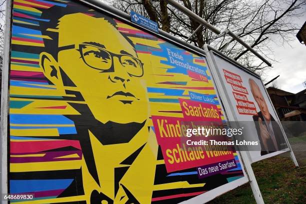 Election campaign billboards for the top candidates Oliver Luksic and Oskar Lafontaine pictured on March 6, 2017 in Saarbruecken, Germany. Saarland...