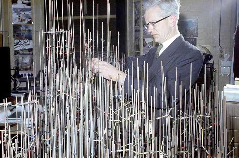 John Kendrew with forest of model colour rods from the 1960s.