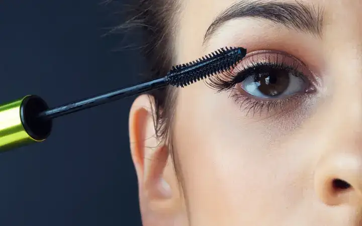 Mascara being applied to a female eye