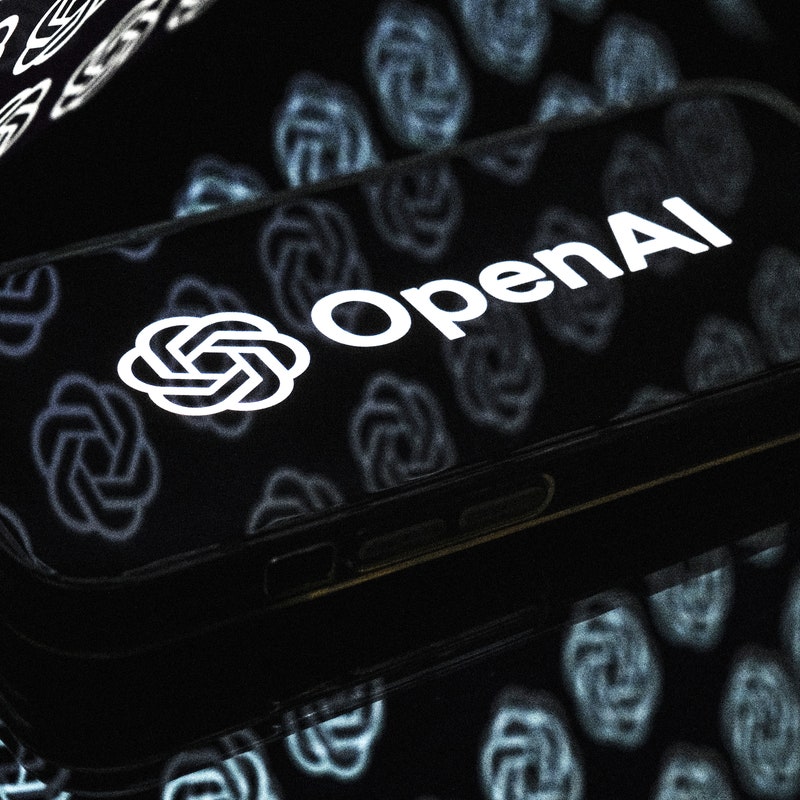 OpenAI logo shown on a smartphone screen