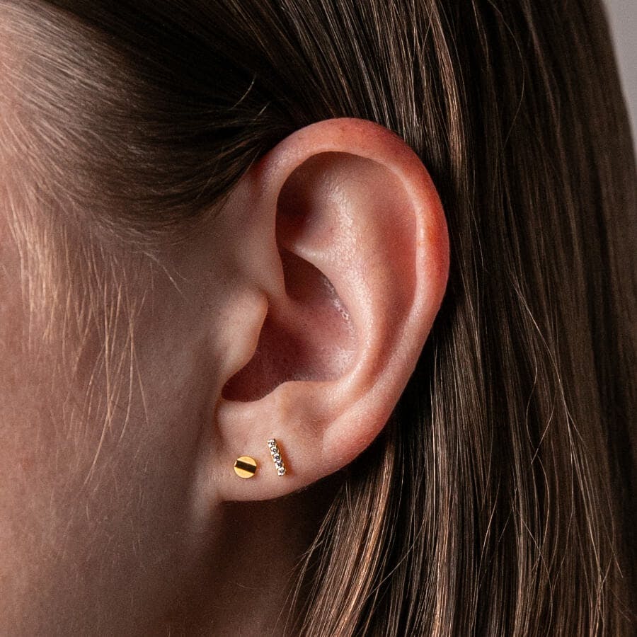 Pave Bar Studs in Titanium (Gold) on model