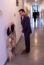 Guests enjoying graduate student work on display in the art annex.