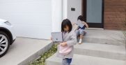 Two girls slide their Surface Go's into bags