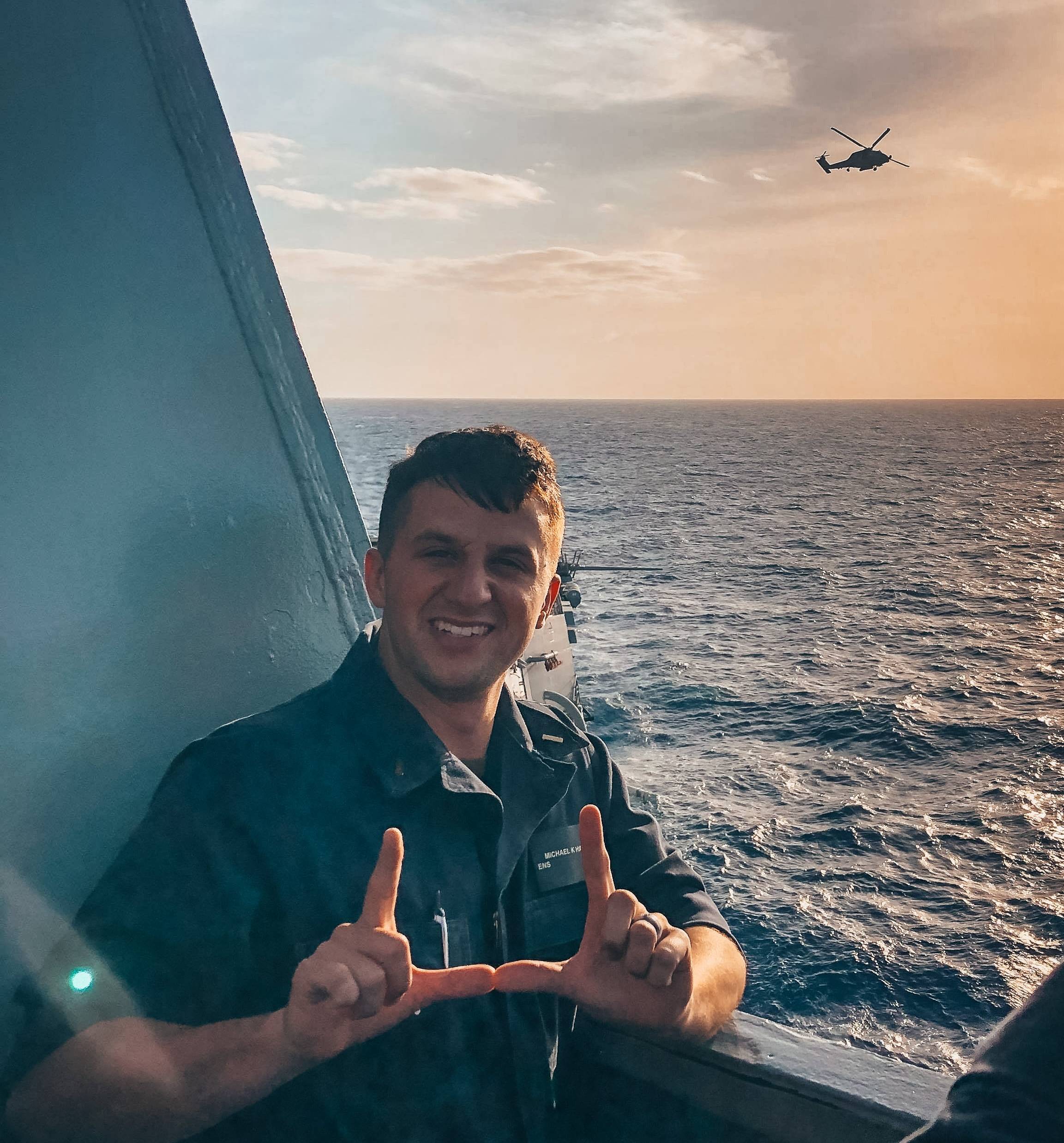 ensign flashing the U at sea