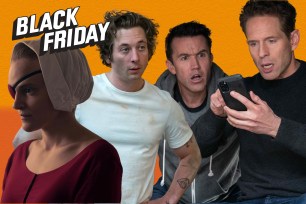 A group of celebrities including Madeline Brewer, Glenn Howerton, Rob McElhenney, and Jeremy Allen White looking at a phone for a Hulu Black Friday deal