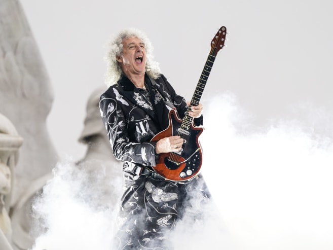 Queen guitarist Brian May says he had a 'minor stroke' but can still play