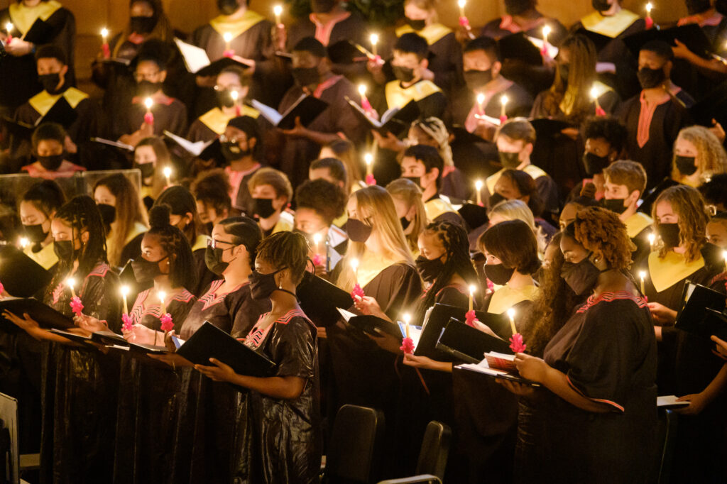 Choir singing wih glowing candles