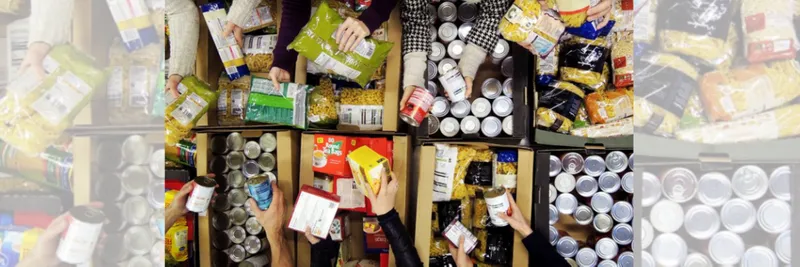 People sorting through boxes of food