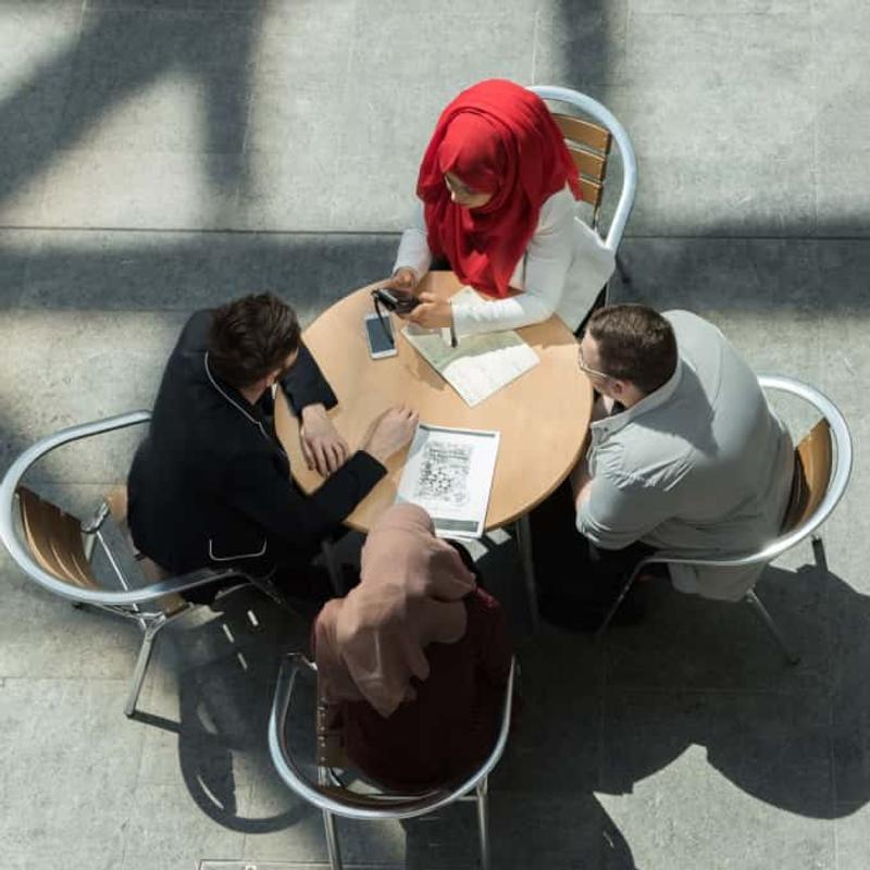 People sat around a table