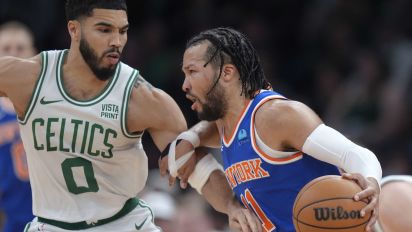 Associated Press - New York Knicks guard Jalen Brunson (11) drives past Boston Celtics forward Jayson Tatum (0) during the first half of an NBA basketball game Thursday, April 11, 2024, in Boston. (AP Photo/Steven Senne)