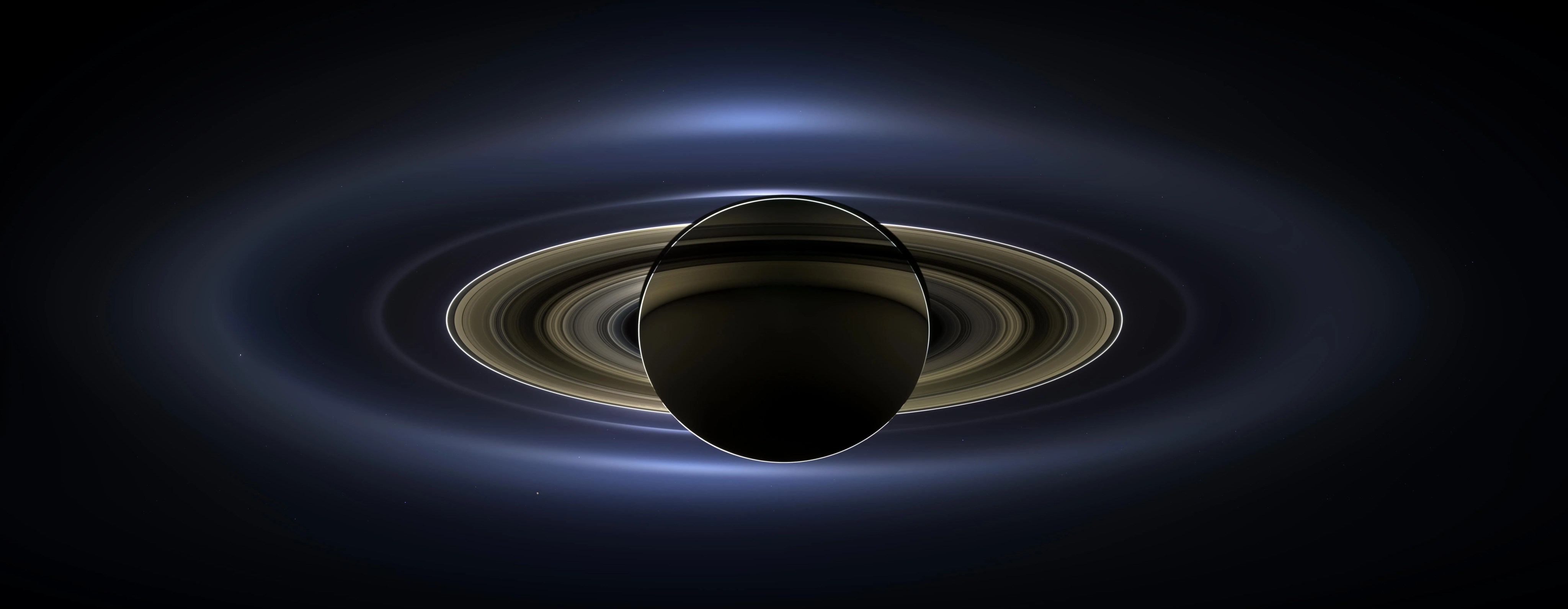 Saturn captured with an ethereal glow as it is backlit by the Sun.