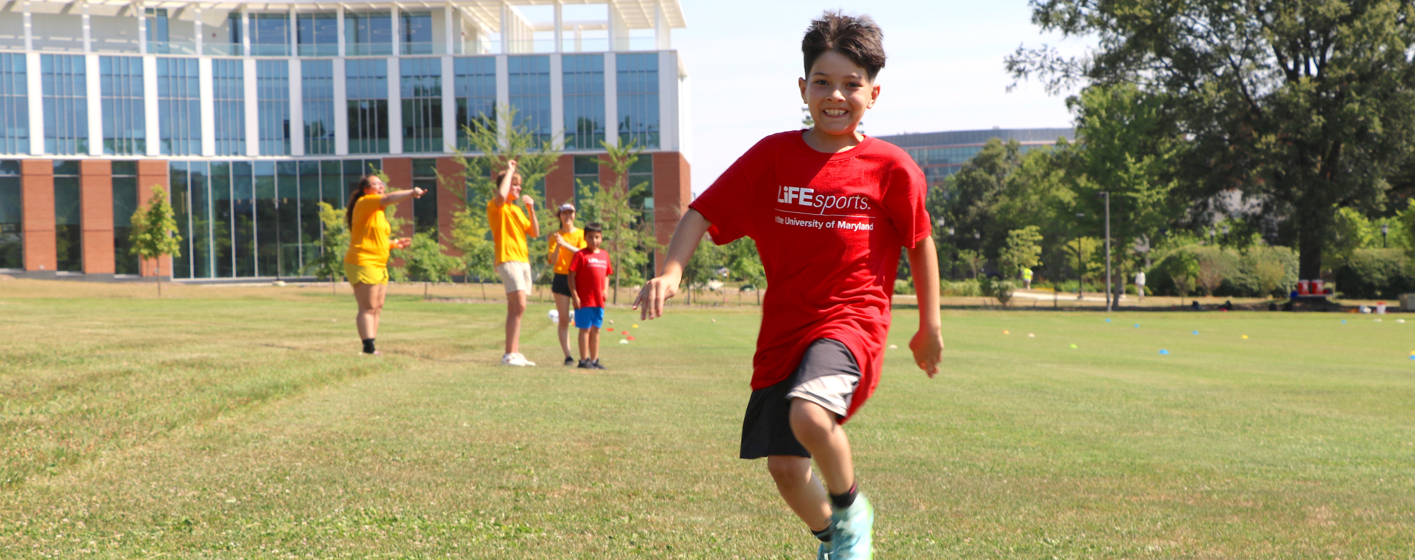 Young kid playing kickball