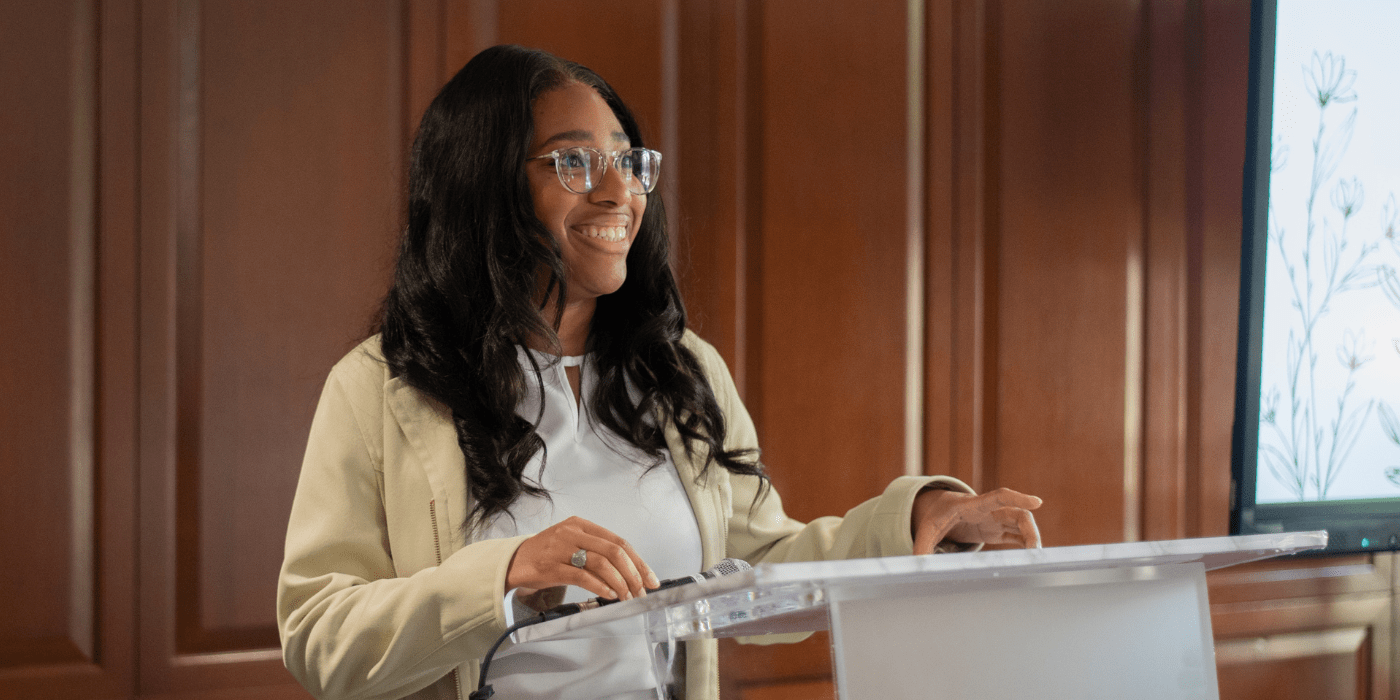 Students speaks at podium