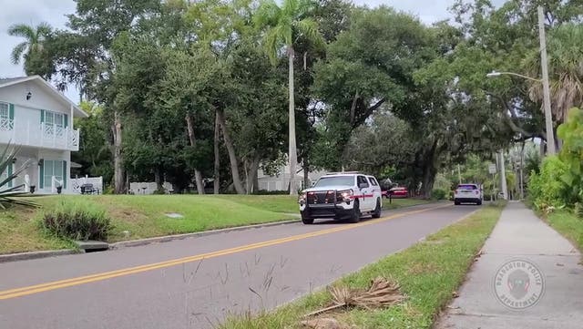 <p>Florida police drive through neighborhoods to warn about evacuation orders.</p>