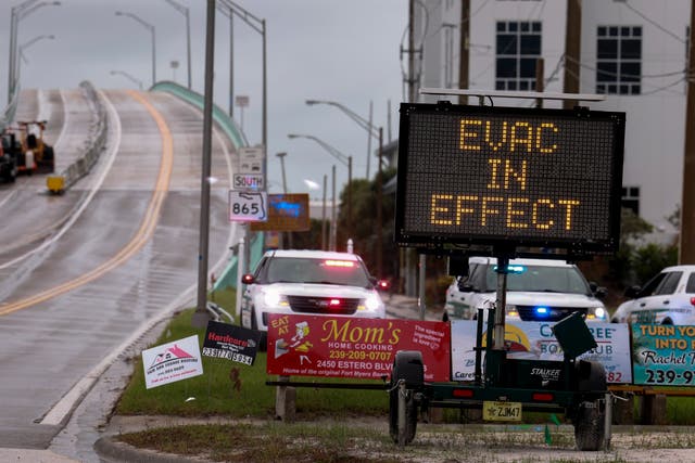 <p>A sign indicates that an evacuation order is in effect for the beach area before Hurricane Milton's arrival on October 08, 2024, in Fort Myers, Florida</p>