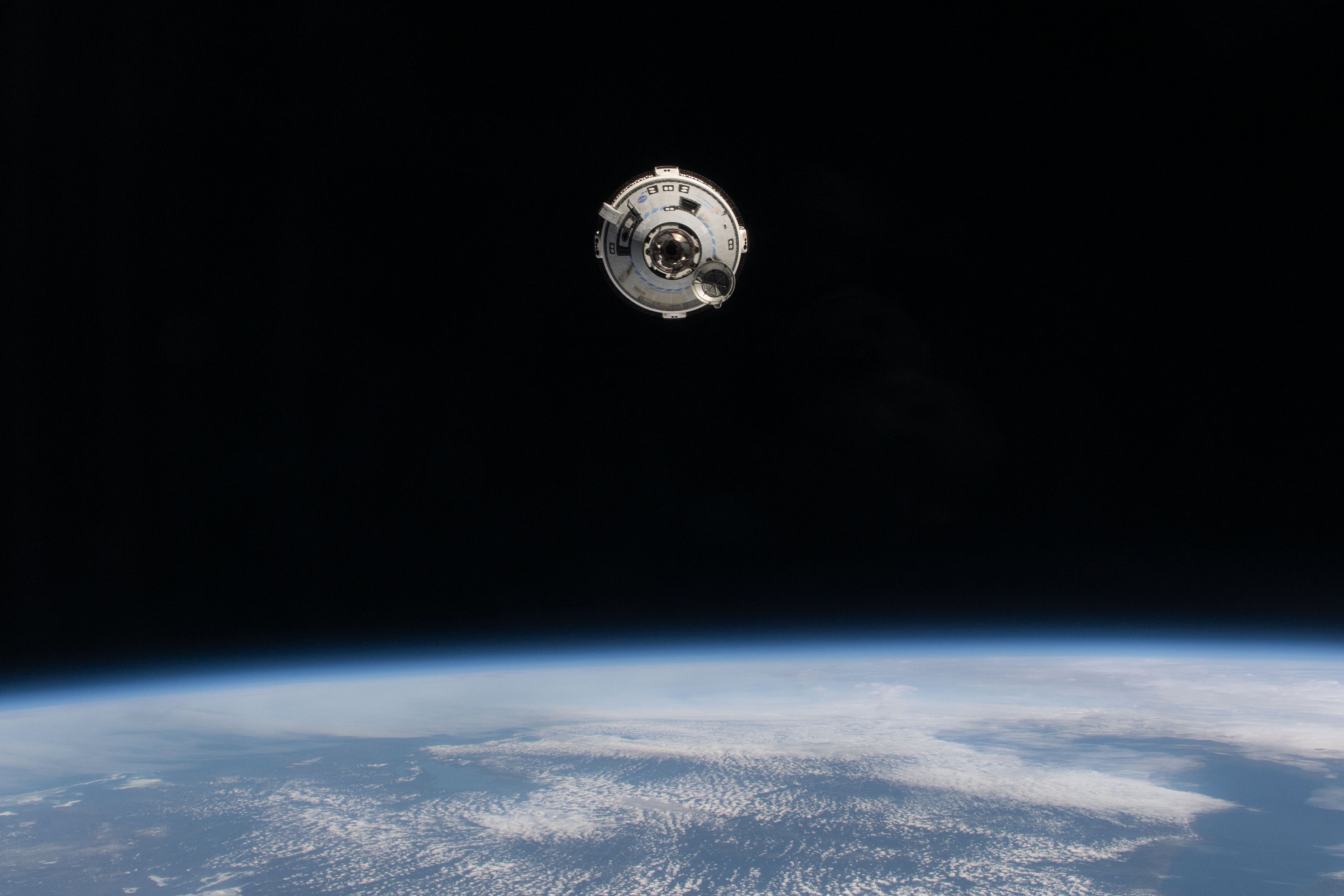 Boeing’s Starliner spacecraft on NASA’s Crew Flight Test approaches the International Space Station while orbiting 263 miles above Quebec, Canada