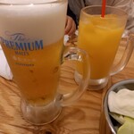 串カツ田中 - 生ビール、オレンジジュース