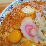 Ramen Kokumaru - 玉子は溶かさない派。生のままレンゲで一口。