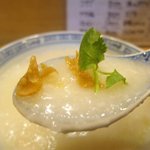 Shinshin - 中華粥にトッピングを乗せて食べる