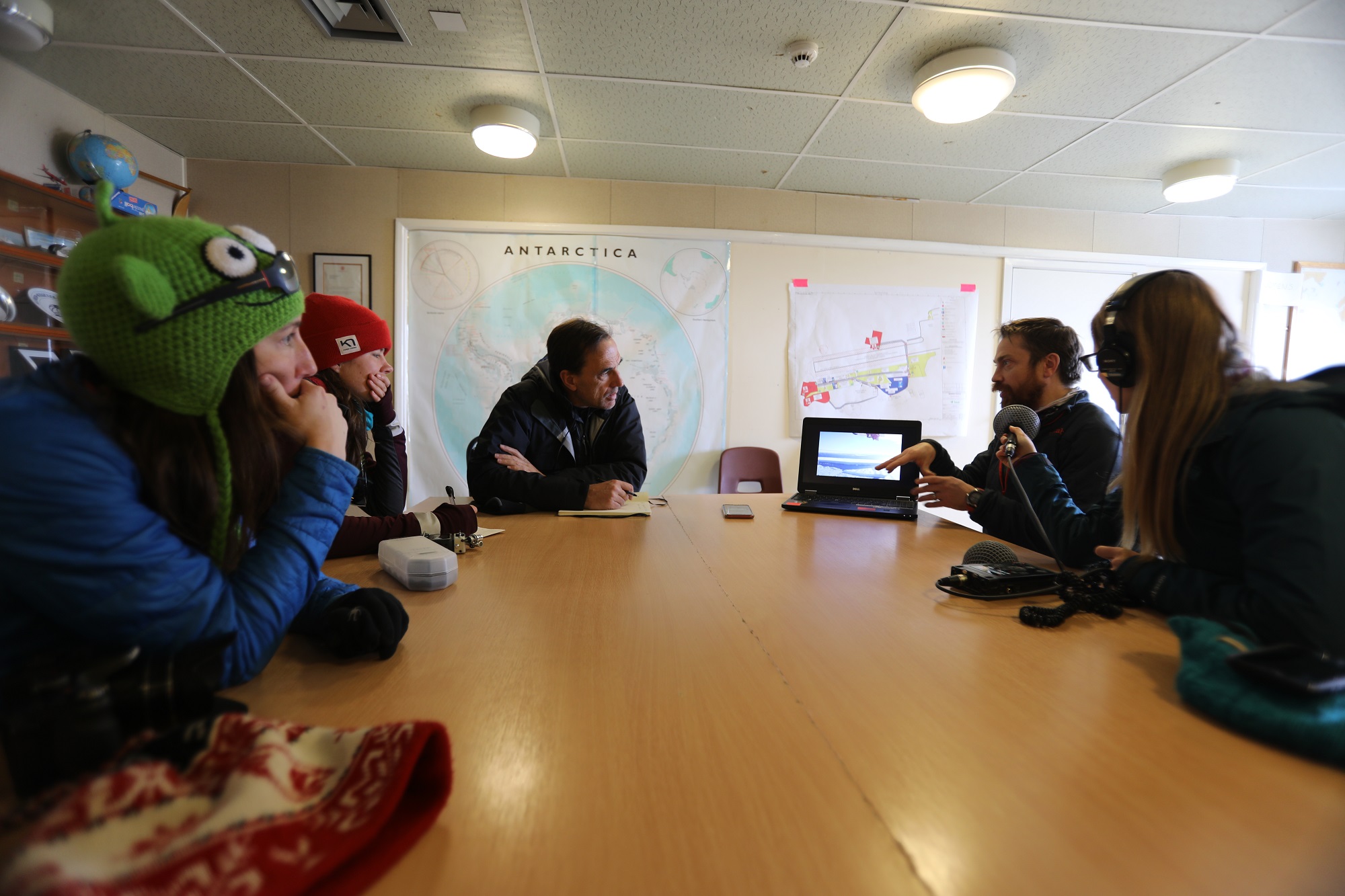 Researchers learn about Carl Robinson's flight collecting data on ice and bedrock in the region.