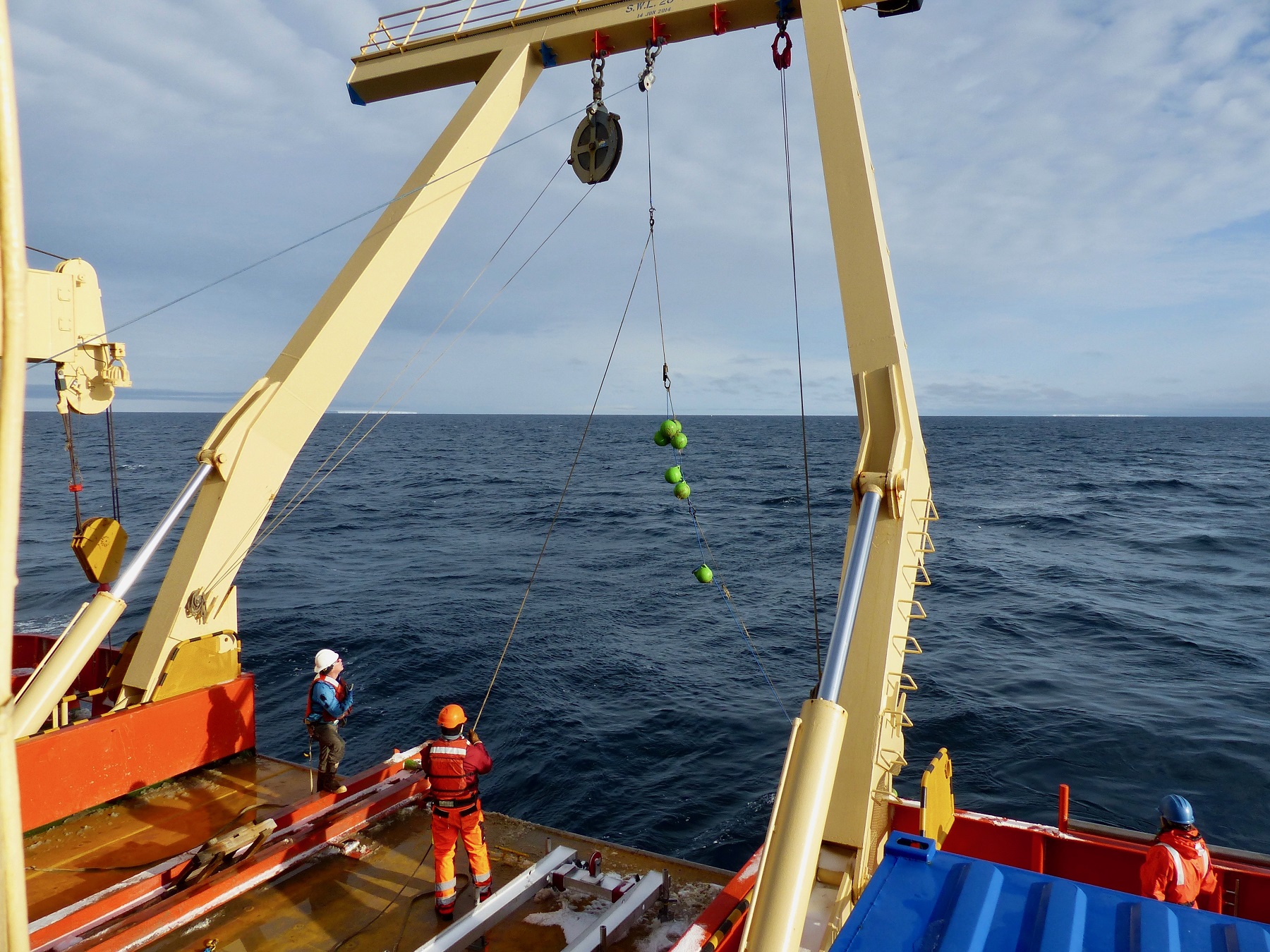 Pulling the mooring line on deck.