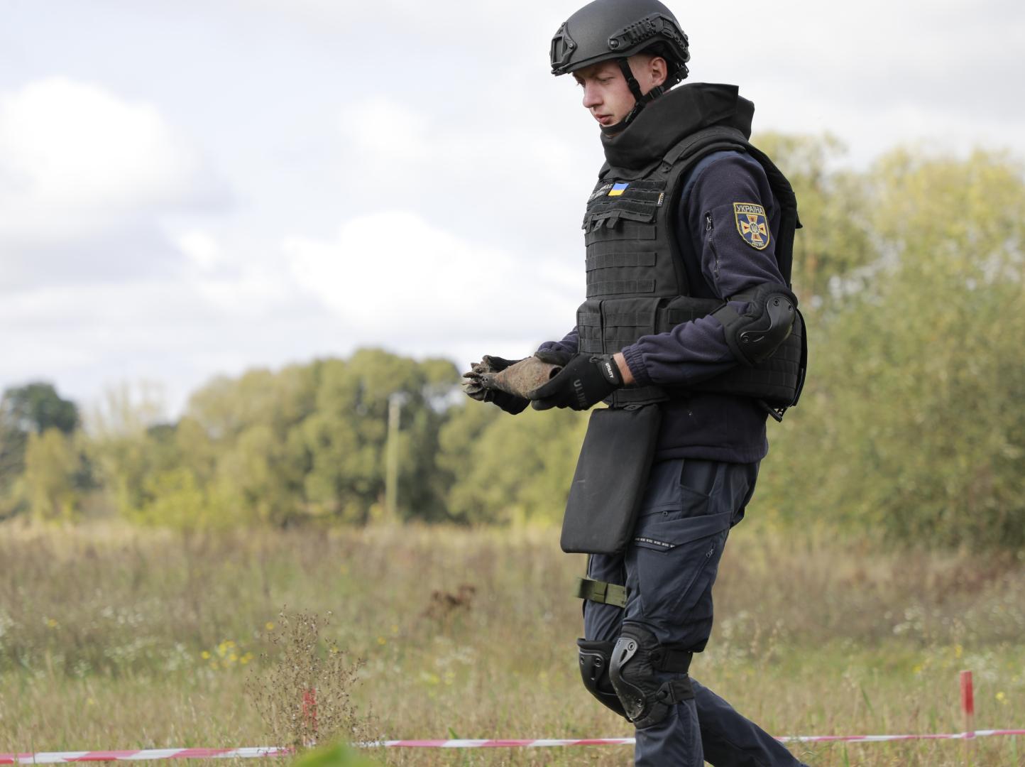 Picture of an officer operating a drone 