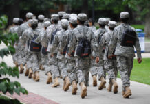 Members of the Junior ROTC program pass through the Diag.