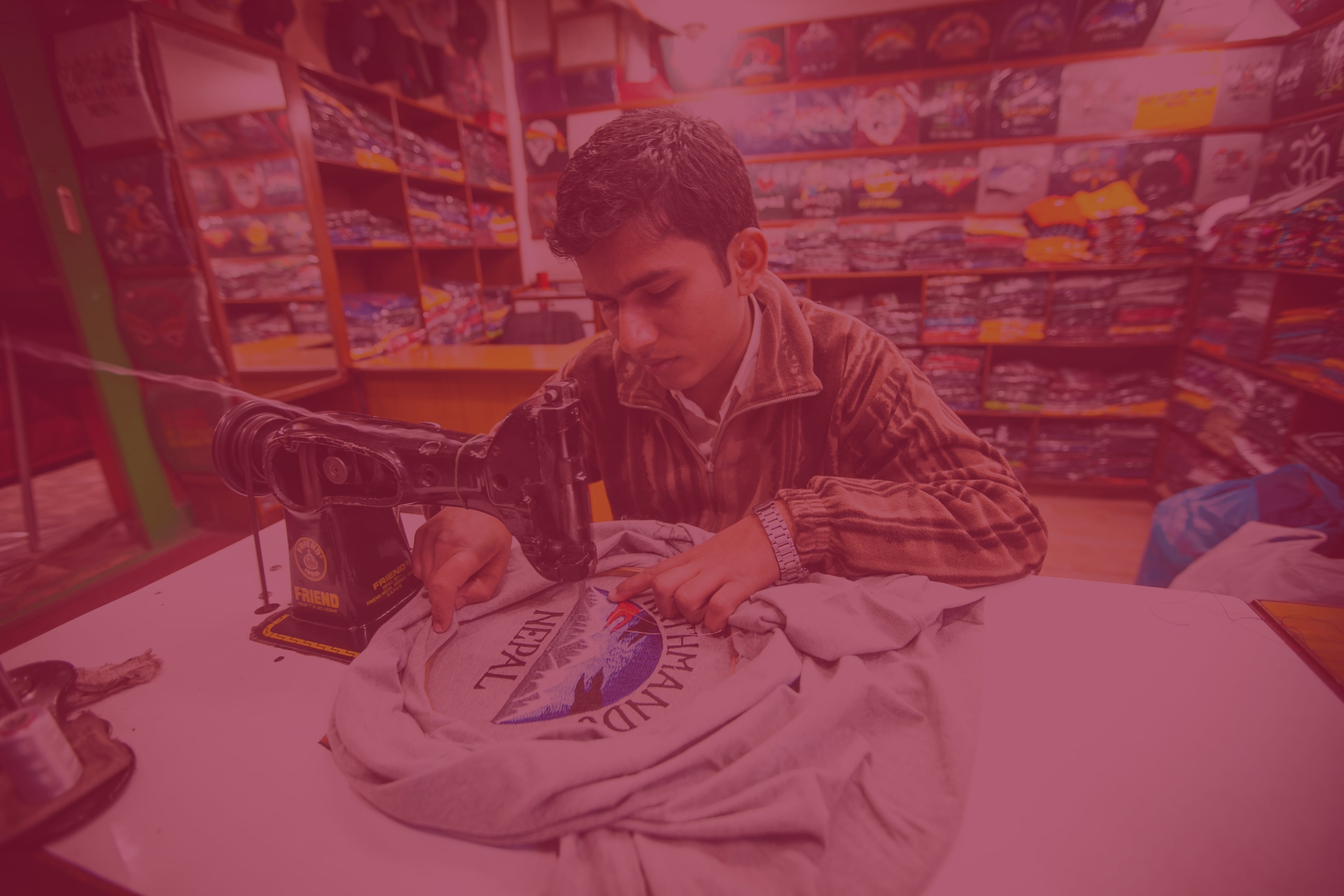 A man working in a sewing shop.