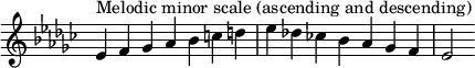  {
\override Score.TimeSignature #'stencil = ##f
\relative c' {
  \clef treble \key es \minor \time 7/4
  es4^\markup { Melodic minor scale (ascending and descending) } f ges aes bes c d es des! ces! bes aes ges f es2
} }
