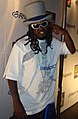 Contemporary hip-hop musician T-Pain wearing a blue-and-white striped top hat at the Video Music Awards in 2008