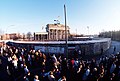 People wait for the official opening of the Brandenburg Gate december 1st 1989