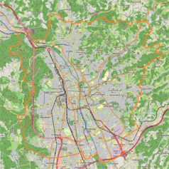 Mapa konturowa Grazu, w centrum znajduje się punkt z opisem „Uniwersytet Karola i&nbsp;Franciszka w&nbsp;Grazu”